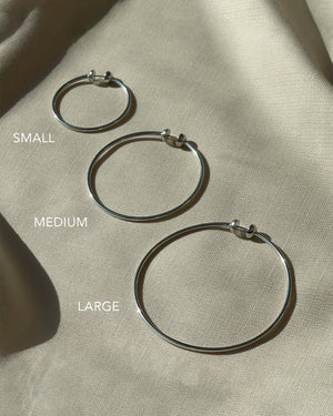 
            
                Load image into Gallery viewer, Jenny Bird Icon Hoops - Small, Available in 2 Colors
            
        